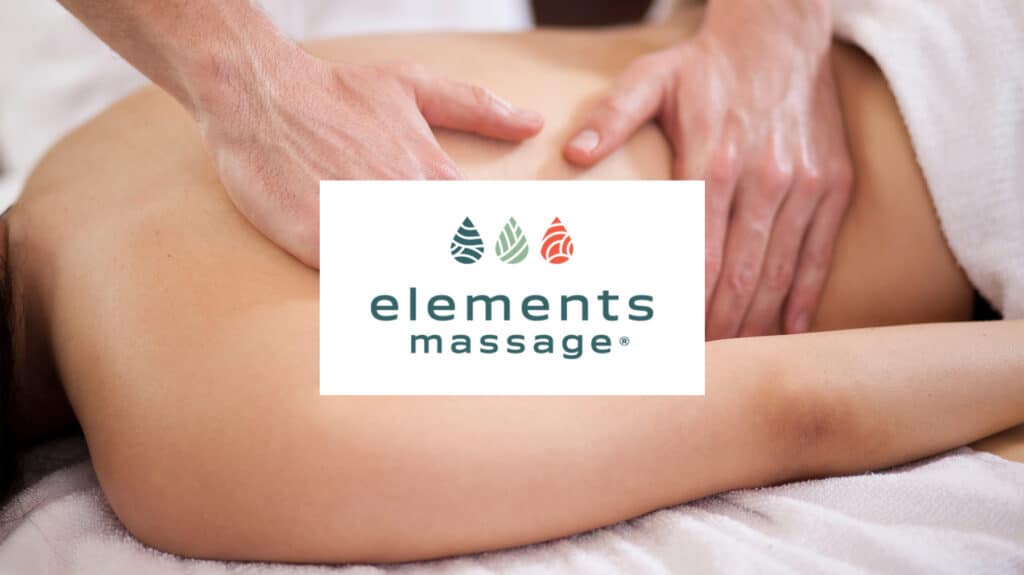 Female client receiving deep tissue massage